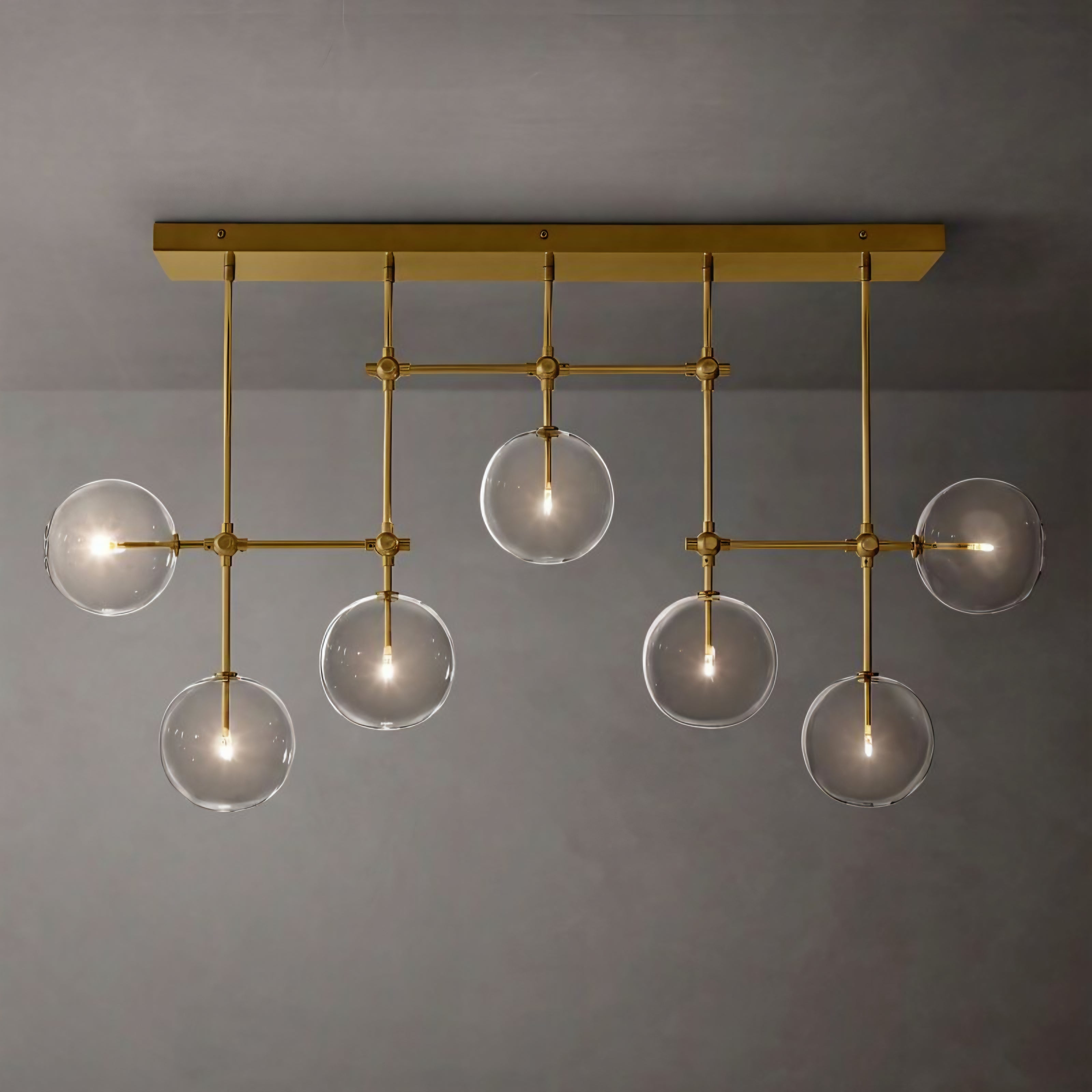 Glass Globe Linear Chandelier – Gold